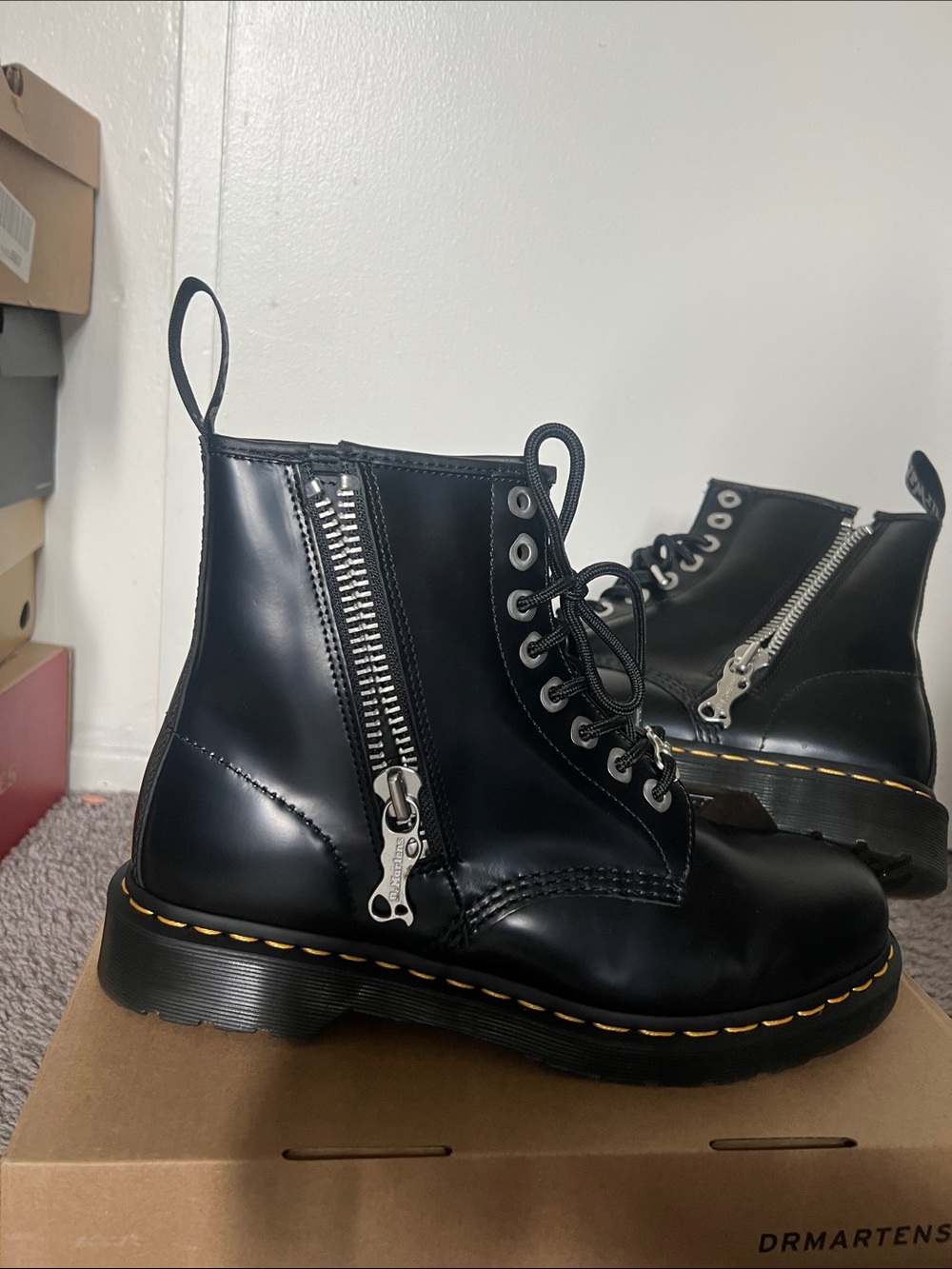 Dr. Martens Black Leather Boots with Yellow Stitching